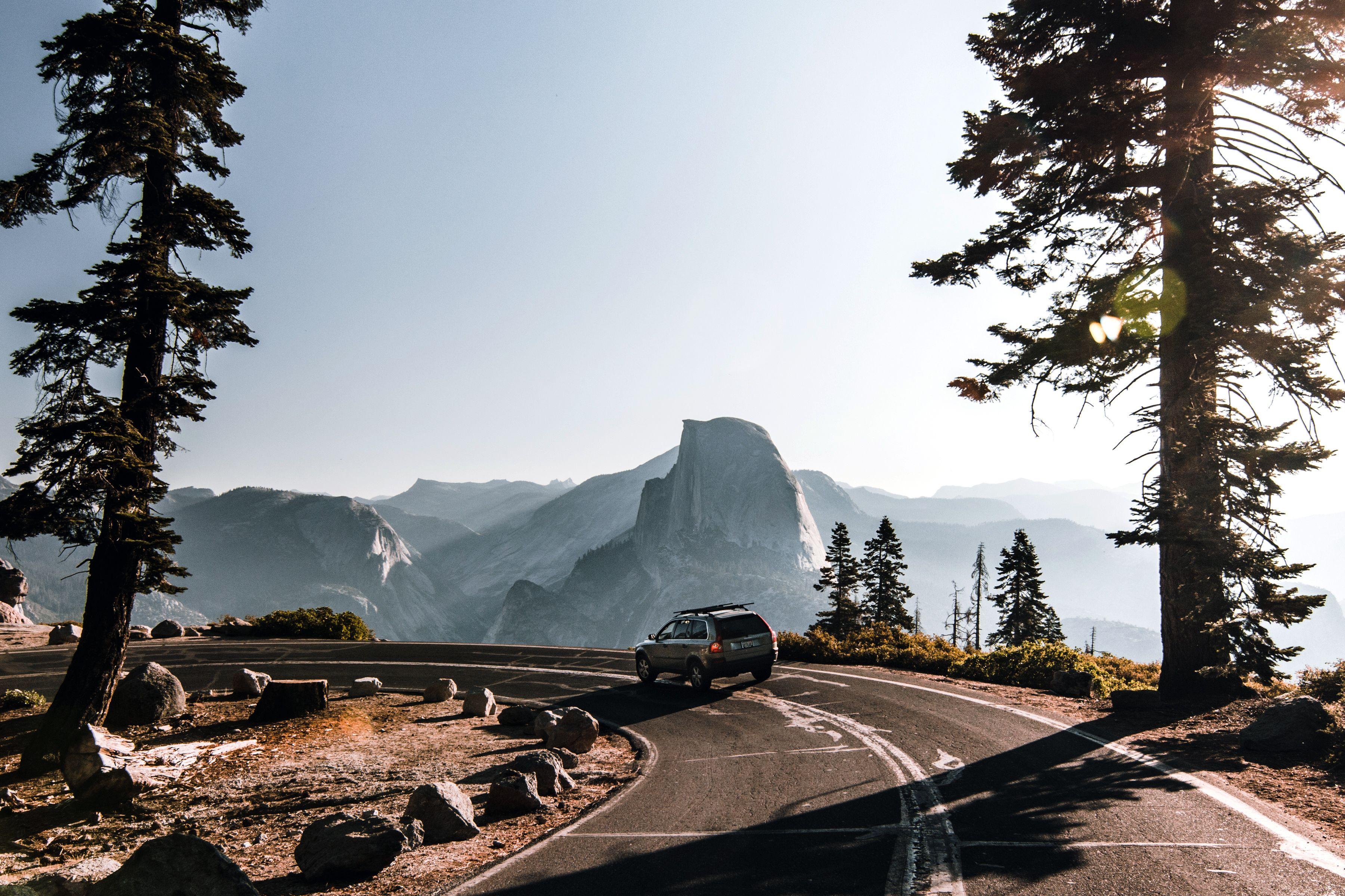 Car driving glacier road in Yosemite national park