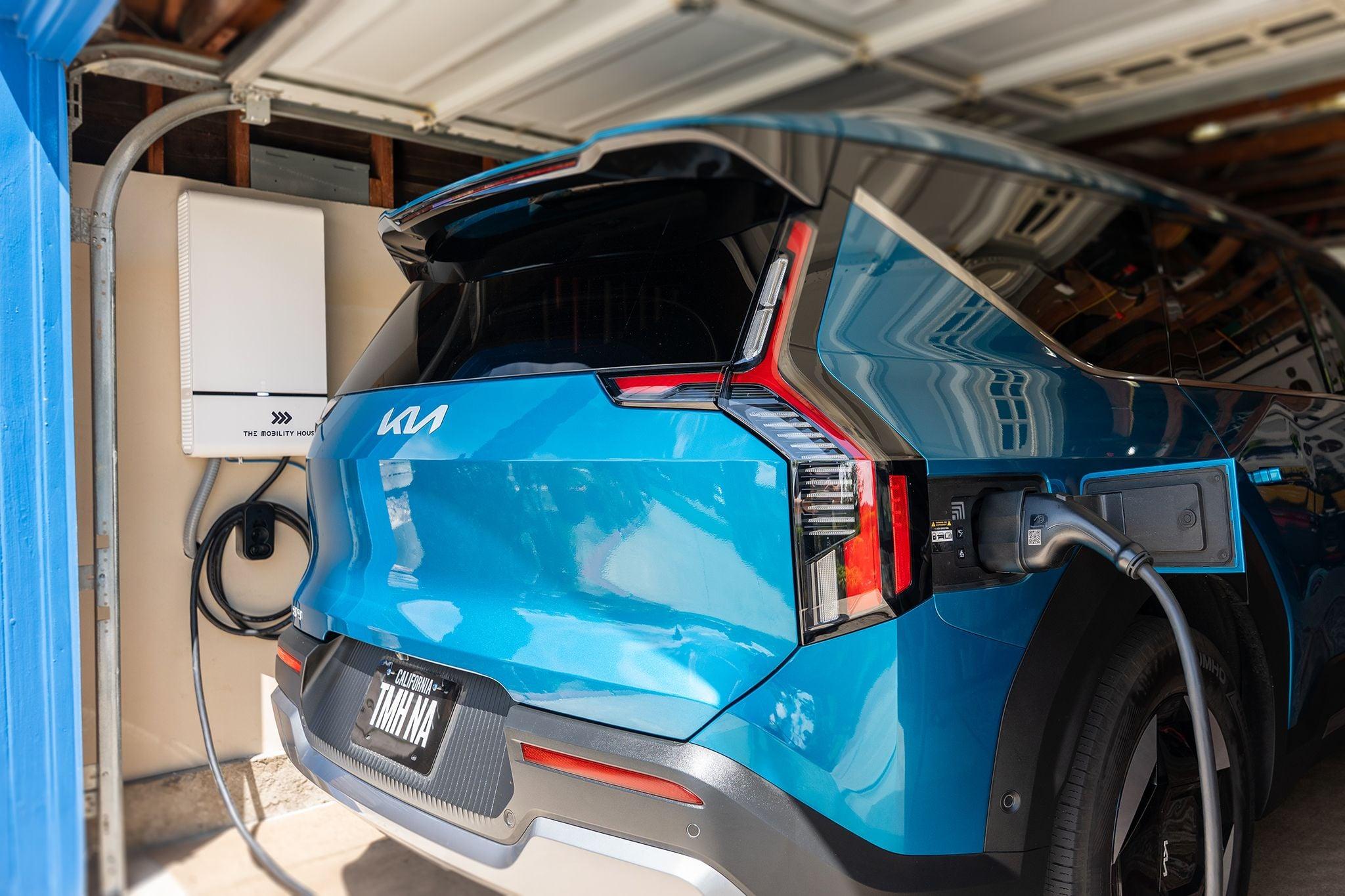 Wallbox V2G Charger plugged into a KIA EV9 in a residents garage