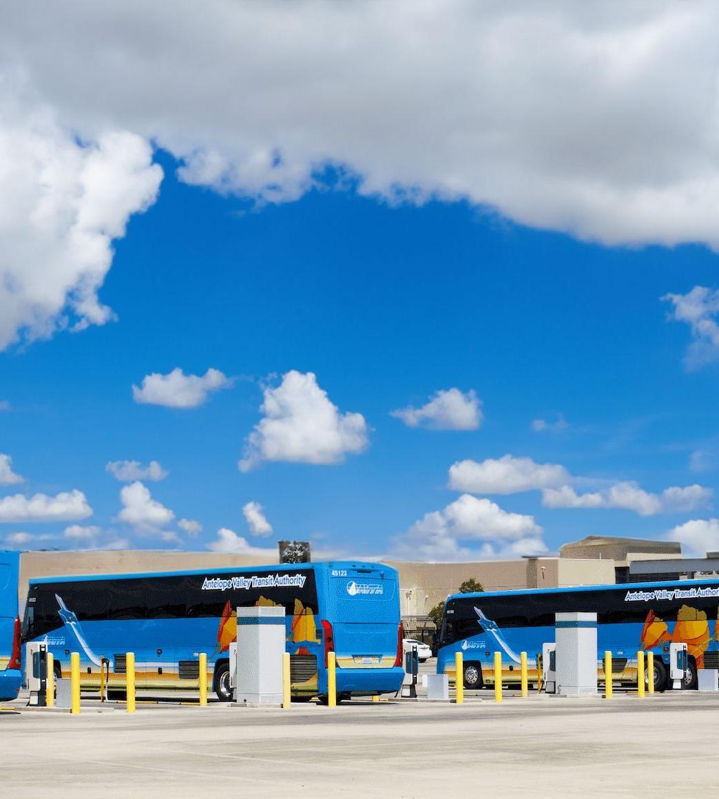 A bus depot with multiple buses